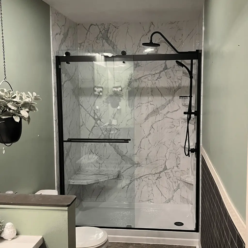 Modern walk-in shower with marble walls installed by Windows Plus