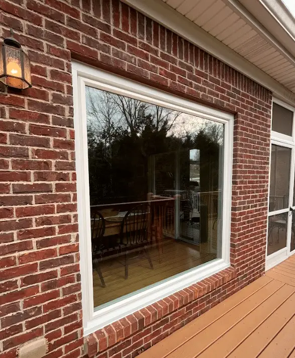 After: a new Windows Plus picture window on a Berea, KY brick home